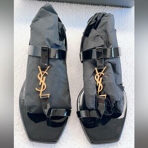 SAINT LAURENT  YSL Cassandra patent Leather Flat Sandals